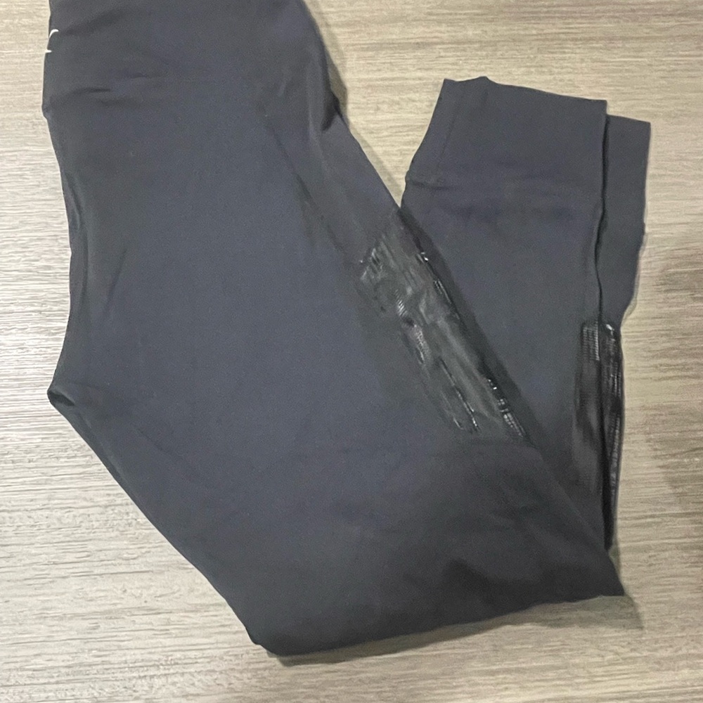 ZYIA black leggings with reflective detail. Super cute.